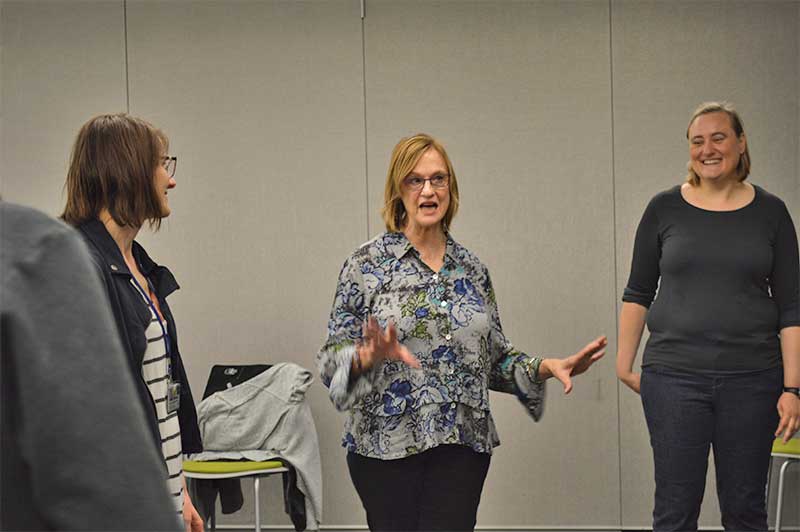  Carol Schindler from the Alan Alda Center for Communicating Science leads an improv exercise during the workshop.